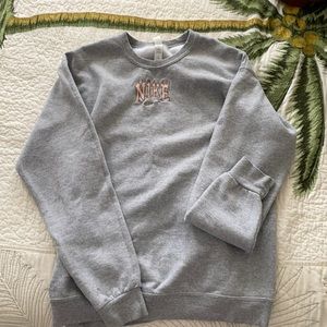 grey and brown nike crewneck